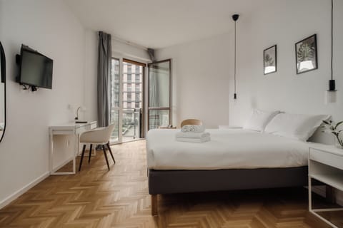 Apartment, 3 Bedrooms, Balcony, Courtyard View | Desk, laptop workspace, iron/ironing board, free WiFi