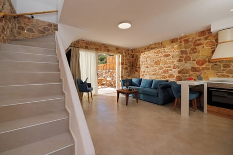 Villa, Sea View | Living area | 40-inch flat-screen TV with digital channels