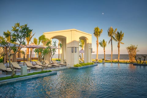 Outdoor pool, pool umbrellas, sun loungers