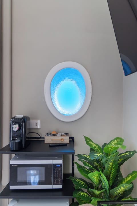 Deluxe Room, Balcony, Sea View | Desk, blackout drapes