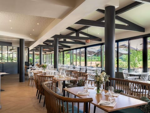 Breakfast, lunch, dinner served; French cuisine, golf course views 