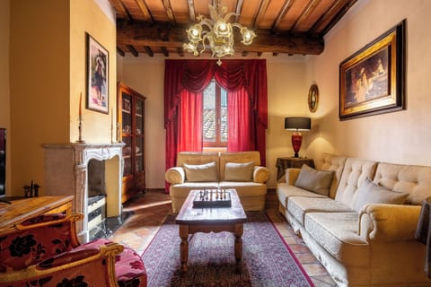 Apartment | Living area | 32-inch flat-screen TV with cable channels