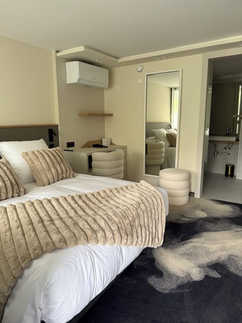 Premium bedding, down comforters, Select Comfort beds, minibar