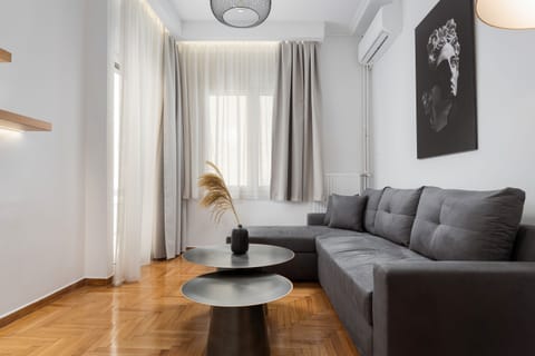 Deluxe Apartment, Balcony | Living area | 40-inch Smart TV with digital channels