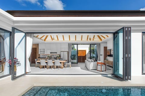 Deluxe Villa, 4 Bedrooms | Living area | 60-inch Smart TV with digital channels