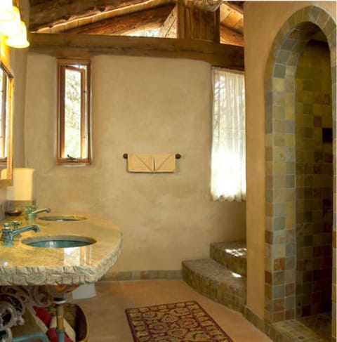 Shower, designer toiletries, hair dryer, bathrobes