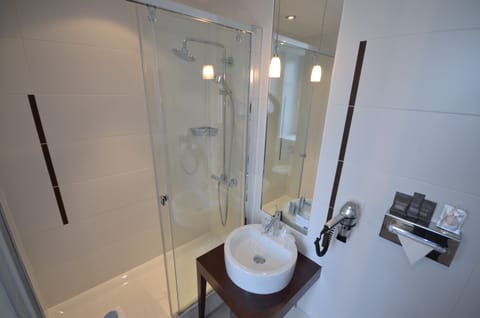 Shower, eco-friendly toiletries, hair dryer, towels