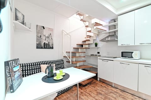 Loft, 1 Double Bed | Living area | 32-inch flat-screen TV with cable channels