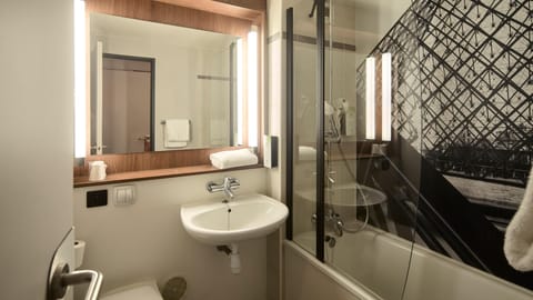 Eco-friendly toiletries, hair dryer, towels