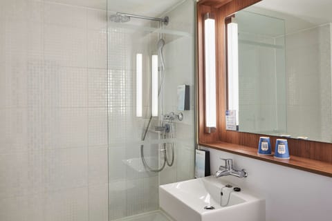 Eco-friendly toiletries, hair dryer, towels