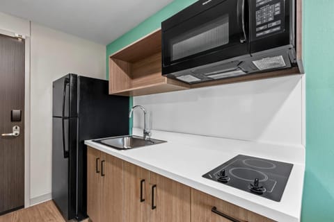 Suite, 1 Queen Bed, Non Smoking | Desk, laptop workspace, blackout drapes, free WiFi