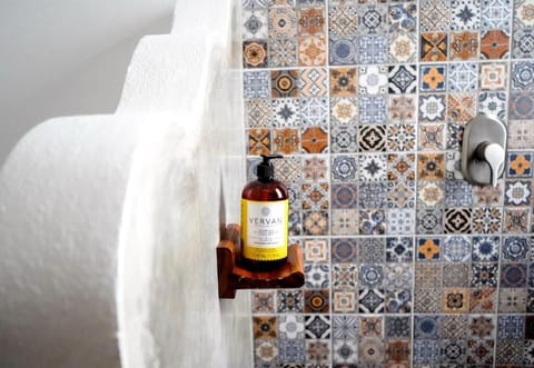 Shower, rainfall showerhead, towels, soap