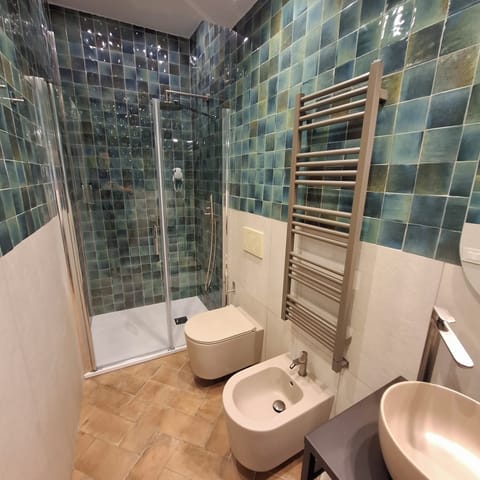 Bathroom | Shower, free toiletries, bathrobes, towels
