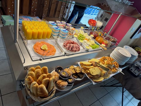 Daily buffet breakfast (EUR 14 per person)