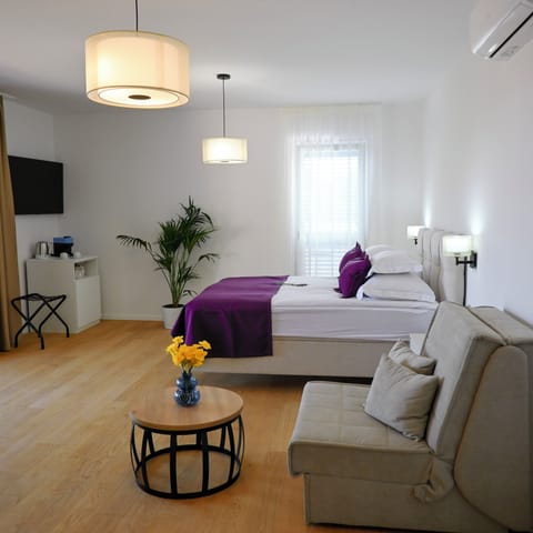 Deluxe Double Room, Balcony, Sea View | In-room safe, desk, laptop workspace, blackout drapes