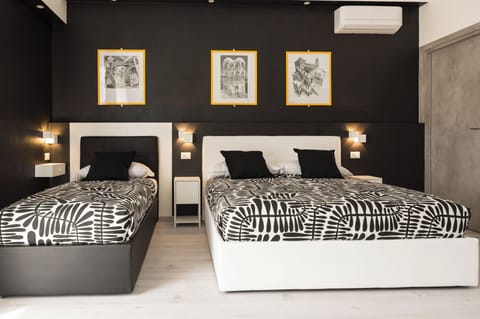 Triple Room | In-room safe, desk, laptop workspace, blackout drapes