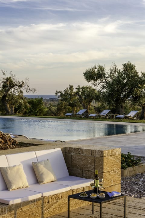 Seasonal outdoor pool, pool umbrellas, sun loungers
