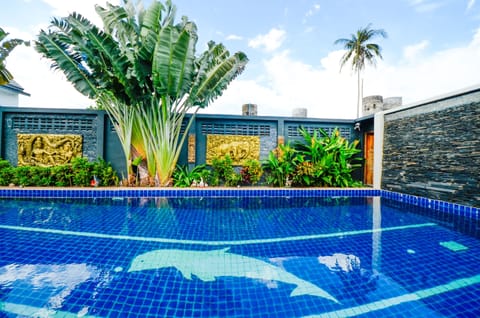Outdoor pool, open 7:30 AM to 10:30 PM, free cabanas, pool umbrellas