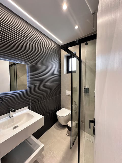 Comfort Double Room, Balcony, Beach View | Bathroom | Shower, hair dryer, slippers, towels