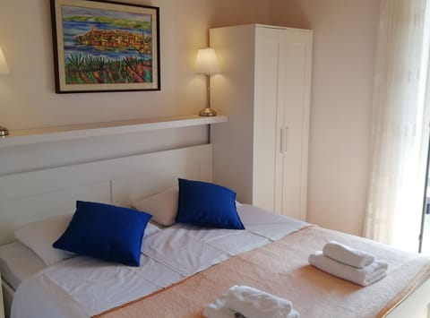 Apartment (One Bedroom Apartment with Balcony an) | 4 bedrooms, cribs/infant beds, free WiFi