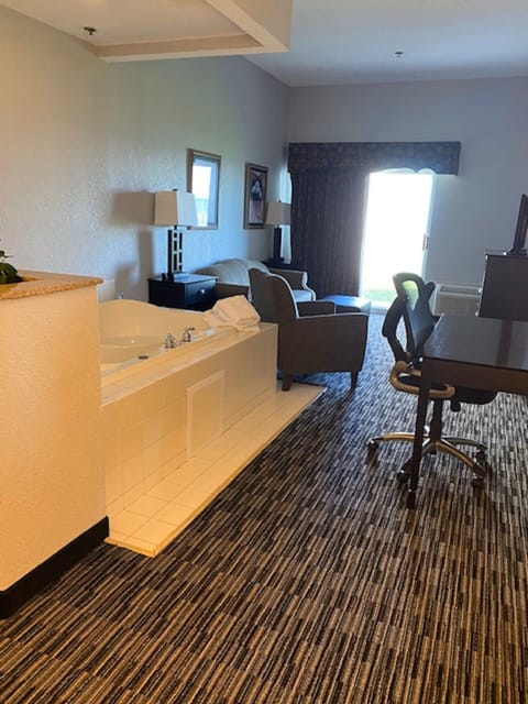 Executive Suite, 2 Bedrooms, Lakeside | Desk, laptop workspace, iron/ironing board, free WiFi