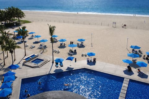On the beach, white sand, beach towels, beach massages