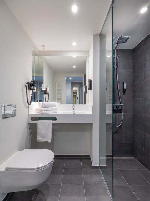 Shower, rainfall showerhead, hair dryer, towels