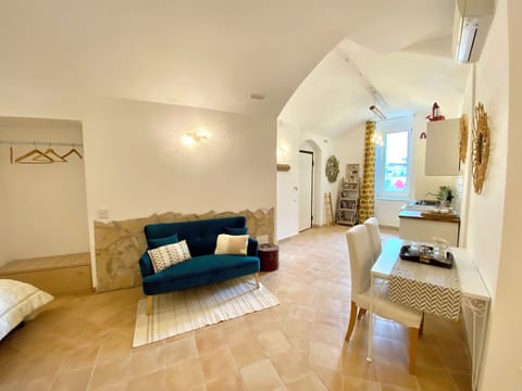 Luxury Townhome, City View | Living area | Flat-screen TV