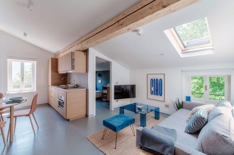 Apartment, Patio, Lake View | Living area | 30-inch TV with digital channels