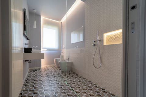 Superior Room | Bathroom | Shower, hair dryer, towels, soap