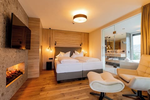 Luxury Suite, Balcony, Garden View | In-room safe, desk, laptop workspace, blackout drapes