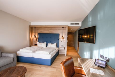 Superior Double Room, Balcony, Garden View | In-room safe, desk, laptop workspace, blackout drapes