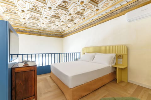 Deluxe Suite, Balcony | Minibar, in-room safe, blackout drapes, soundproofing