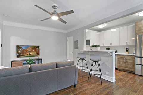 Comfort Apartment | Living area | 55-inch TV with digital channels, streaming services