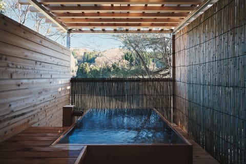 Luxury Suite, Accessible Bathtub, Balcony | Bathroom | Separate tub and shower, spring water tub, free toiletries, hair dryer
