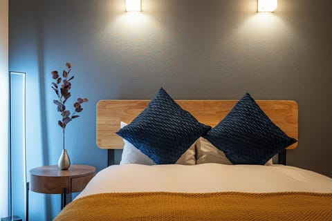 Family Apartment, Balcony | Blackout drapes, iron/ironing board, free WiFi
