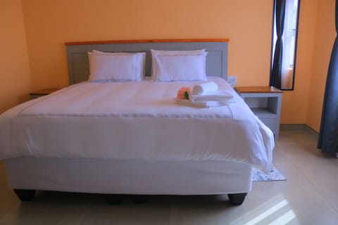 Double or Twin Room, City View | Desk, laptop workspace, iron/ironing board (on request), WiFi (free)