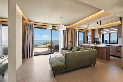 Villa, Sea View | Living area | 55-inch Smart TV with cable channels, fireplace