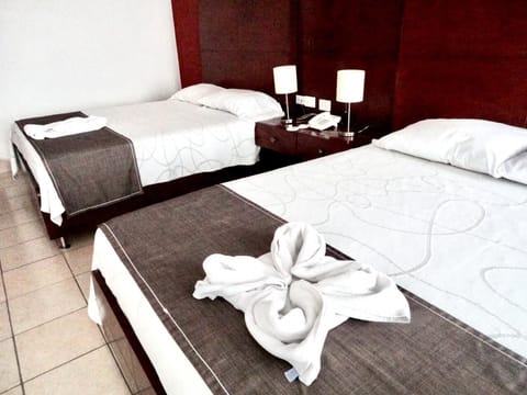 Family Quadruple Room | Individually furnished, desk, iron/ironing board, rollaway beds