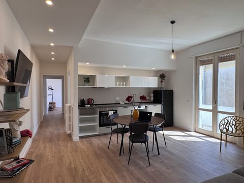 Apartment, Balcony, Courtyard View | Living area | Flat-screen TV