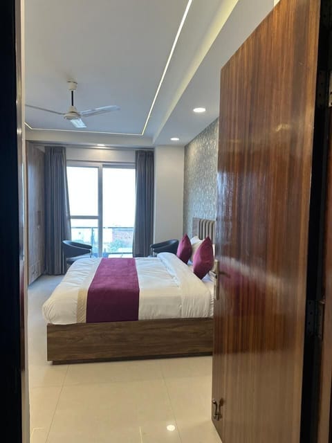 Deluxe Double Room, Balcony, City View | Desk, laptop workspace, free WiFi