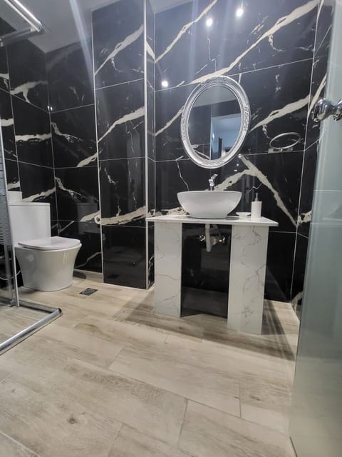 Shower, towels, soap, shampoo