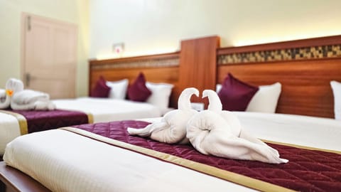 Family Suite | Iron/ironing board (on request), WiFi (free), bed sheets