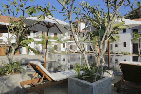 Outdoor pool, open 8:00 AM to 8:00 PM, pool umbrellas, sun loungers
