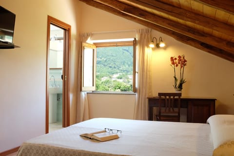 Double Room | Desk, blackout drapes, cribs/infant beds, rollaway beds