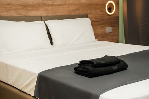 Desk, blackout drapes, WiFi (free), bed sheets