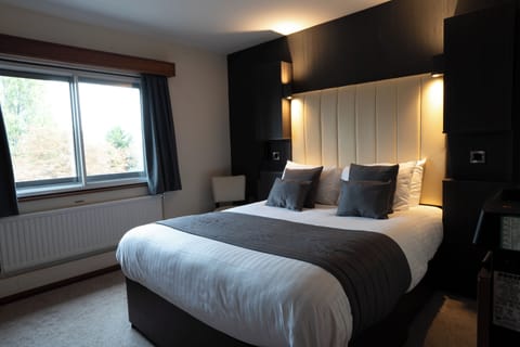 Double Room | Desk, blackout drapes, iron/ironing board, free cribs/infant beds