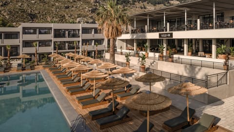 2 outdoor pools, pool umbrellas, sun loungers