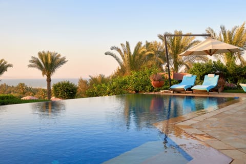 2 outdoor pools, pool umbrellas, sun loungers