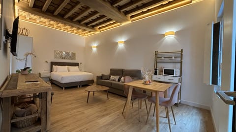 Junior Suite, City View | Desk, laptop workspace, soundproofing, iron/ironing board